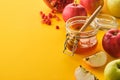 Honey jar and fresh apples with pomegranate on yellow background, rosh haShana Royalty Free Stock Photo