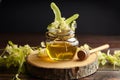 Honey in jar with linden flowers and honey dipper on wooden background Royalty Free Stock Photo