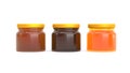 honey jar set. orange marmalade or maple syrup or jam in glass jar isolated Royalty Free Stock Photo