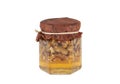 Honey jar with walnuts