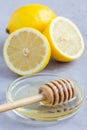 Honey and lemon: cold, flu remedy, concrete background Royalty Free Stock Photo