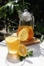 Honey lemon drink in a transparent glass and jar. Royalty Free Stock Photo