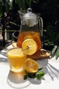 Honey lemon drink in a transparent glass and jar. Royalty Free Stock Photo