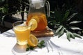 Honey lemon drink in a transparent glass and jar. Royalty Free Stock Photo