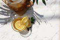 Honey lemon drink in a transparent glass and jar. With negative or copy space. Royalty Free Stock Photo