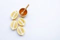 Honey with lemon on white background. Copy space Royalty Free Stock Photo