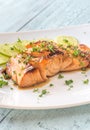 Honey lime salmon on the plate Royalty Free Stock Photo