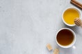 Honey liquid and a Cup of coffee with sugar light background. Copy space for text. Royalty Free Stock Photo