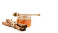 honey pot cinnamon on an isolated white background, rope. copy space, template. Royalty Free Stock Photo