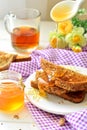 Honey poured on toast - breakfast