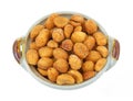 Honey roasted peanuts in small dish