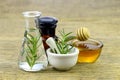 Honey, rosemary and essential oil for homeopathy remedy. Royalty Free Stock Photo