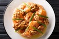 Honey Shrimp are fried with a tempura batter and quickly tossed in a honey sauce and sweetened walnuts close-up. horizontal top Royalty Free Stock Photo