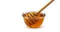 Honey stick and bowl of honey isolated on white background with clipping path Royalty Free Stock Photo