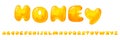 Honey sweet font. Liquid honey cartoon alphabet, Yellow honeycomb vector font. Royalty Free Stock Photo