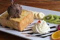 Honey Toast bread topped with ice cream, chocolate