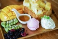 Honey toast and ice cream with Mixed Fruit and caramel. Royalty Free Stock Photo