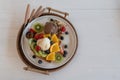 Honey toast with ice cream and mixed fruit on white wooden table Royalty Free Stock Photo