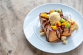 Honey toast ice cream vanilla with sliced fruits and chocolate s Royalty Free Stock Photo