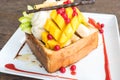 Honey toast with vanilla ice cream , mango , apple Royalty Free Stock Photo