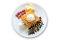 Honey toast with vanilla ice cream, whipped cream and chocolate syrup Royalty Free Stock Photo