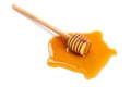 Honey and wooden dipper isolated Royalty Free Stock Photo