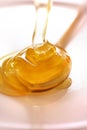 Honey on wooden ladle