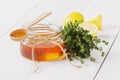 Honey in a wooden spoon and jar Royalty Free Stock Photo