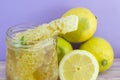 Honeycomb dipper and lemon close up
