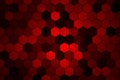 Honeycomb Grid tile random background or Hexagonal cell texture. in color Bright Red with dark or black gradient. Royalty Free Stock Photo