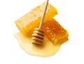 Honeycomb with honey dipper isolated on white background Royalty Free Stock Photo