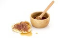 Honeycomb with honey dipper isolated on white background Royalty Free Stock Photo