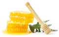 Honeycomb and honey stick on a white background. Isolated Royalty Free Stock Photo