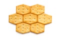 Honeycomb pattern of crackers on white background. Royalty Free Stock Photo