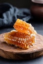 Honeycombs on wooden board. Raw honey Royalty Free Stock Photo