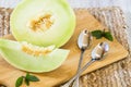 Honeydew Melon Snack On Table With Spoons Royalty Free Stock Photo