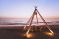 Dinner table for wedding couple on the beach in luxurious romantic hotel