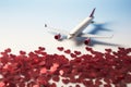 Honeymoon or travel lover concept airplane model and red hearts Royalty Free Stock Photo