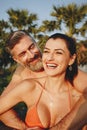 Honeymooners in a swimming pool at a resort Royalty Free Stock Photo