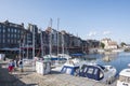 Traditional houses and boats in the old harbor of Honfleur. Normandy, France Royalty Free Stock Photo