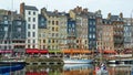 View on harbor promenade with typical breton old houses and boats Royalty Free Stock Photo