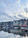 Honfleur harbour in Normandy, France. Color houses and their reflection in the river Royalty Free Stock Photo