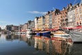 Honfleur harbour in Normandy France. Color houses and their reflection in water Royalty Free Stock Photo