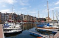 Honfleur harbour in Normandy, France. Color houses and their reflection in water. Royalty Free Stock Photo