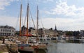 Honfleur harbour in Normandy, France. Color houses and their reflection in water. Royalty Free Stock Photo