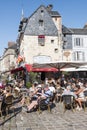 People Sitting on the Terrace of the Restaurant. Port of Honfleur in the Calvados department in northwestern France