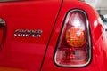 Hong Kong, Hong Kong - 25 April 2018: Close-up of Mini Cooper logo badge, taillights and details on the rear of a red Mini Cooper