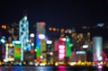 Blurred Night View of Hong Kong City Skyscrapers from Victoria Harbour with Colourful Lights Royalty Free Stock Photo