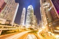 Hong Kong business district at night with light trails Royalty Free Stock Photo