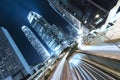 Hong Kong business district at night with light trails Royalty Free Stock Photo